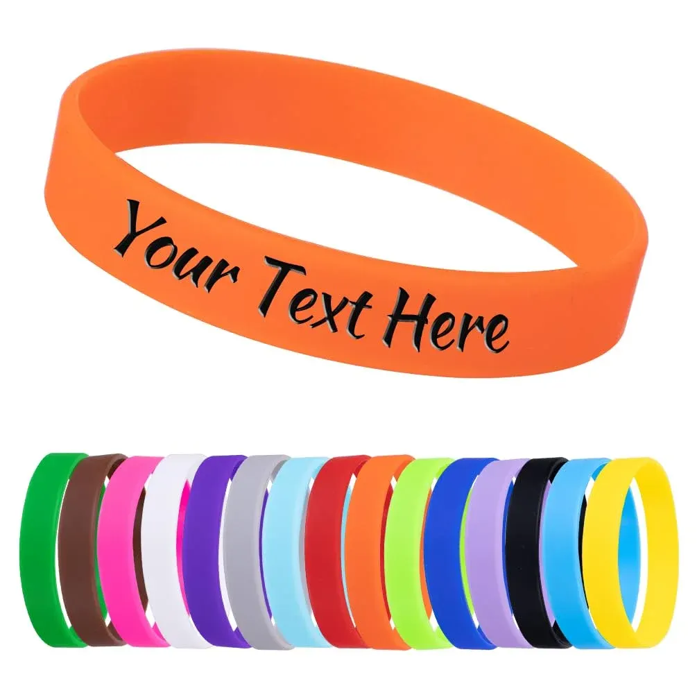 Braccialetto in silicone arancione con scritta personalizzata e i 15 colori disponibili: verde, marrone, rosa, bianco, viola, grigio, azzurro, rosso, arancione, verde lime, blu, lilla, nero, celeste e giallo